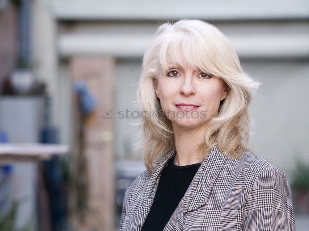 Similar – A kettle colorful in the back, beautiful woman in front