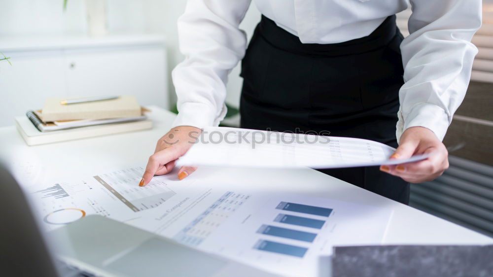 Similar – Image, Stock Photo Young architect working at home drawing plans