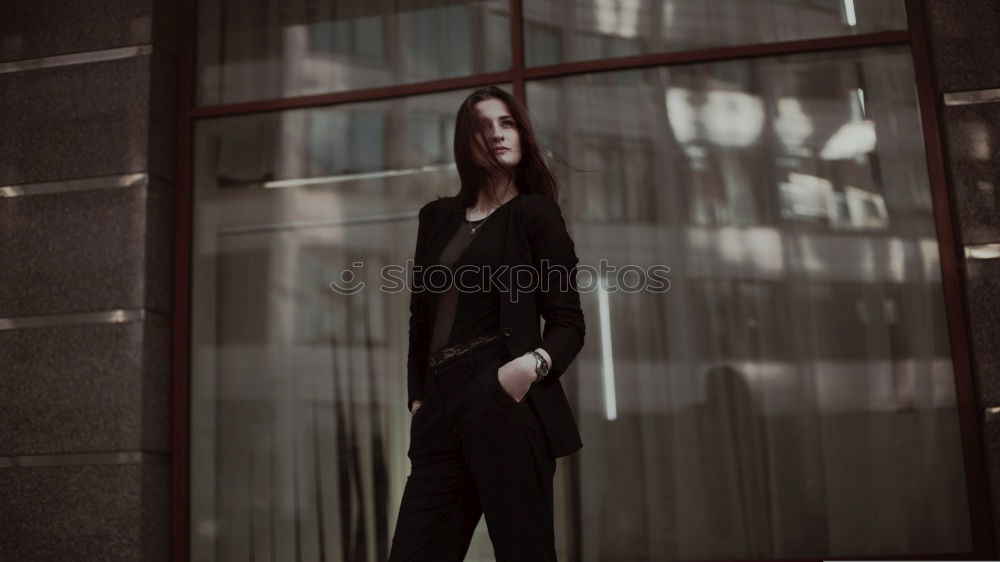 Similar – Young woman standing in front of balcony window wearing high heels and leopard print pants