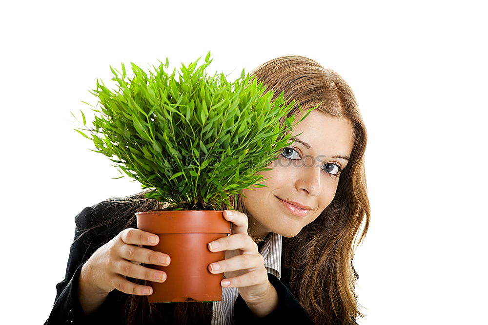 Similar – kid girl is hiding behind house plant in pot