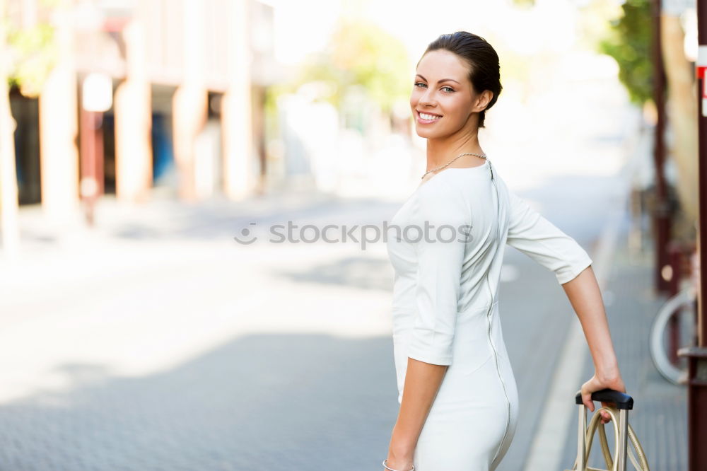 Similar – Image, Stock Photo Young black woman in front of a shop window in a shopping street