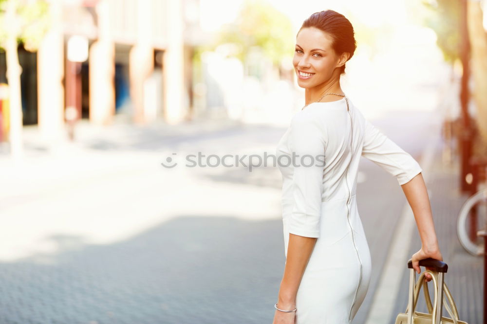 Similar – Image, Stock Photo Young black woman in front of a shop window in a shopping street