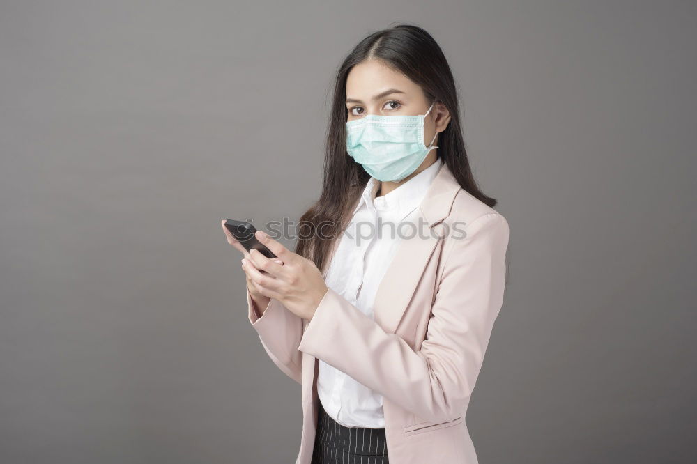 Similar – close up of Photo of a woman wearing protective mask against infectious diseases, coronavirus, covid-19 and flu outdoors. copy space. Coronavirus outbreak in Europe. Flu epidemic spread prevention