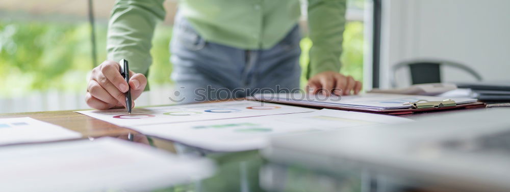 Similar – Image, Stock Photo Young architect working at home drawing plans