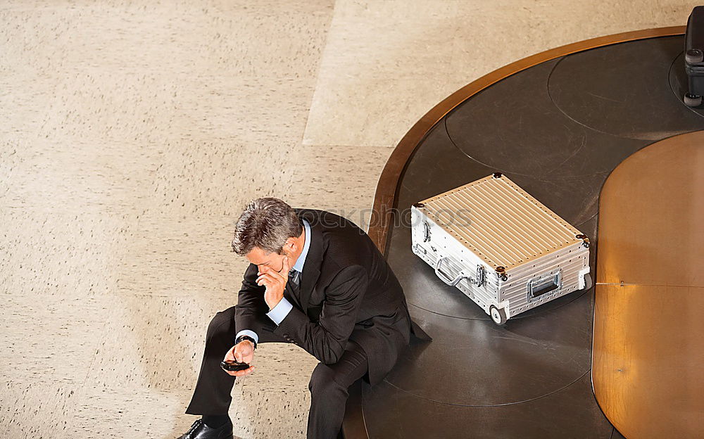 Similar – Attractive businesswoman using smartphone while sitting