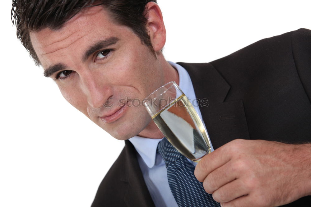 Similar – Image, Stock Photo Elegant young woman in a white dress drinking white wine at a function and smiling up at her male partner