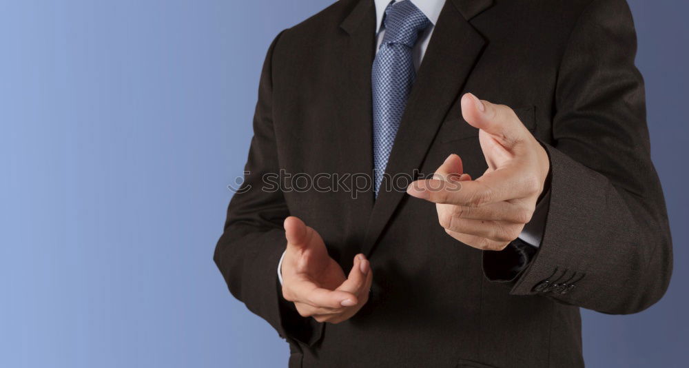 Similar – Man geting his fist on the table