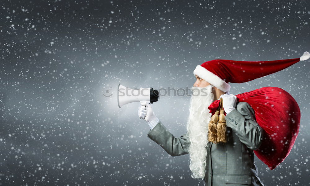 Image, Stock Photo boy with a megaphone at christmas on black background