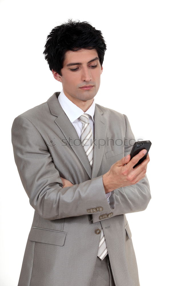 Similar – Image, Stock Photo Businessman Texting on his Phone in the Street