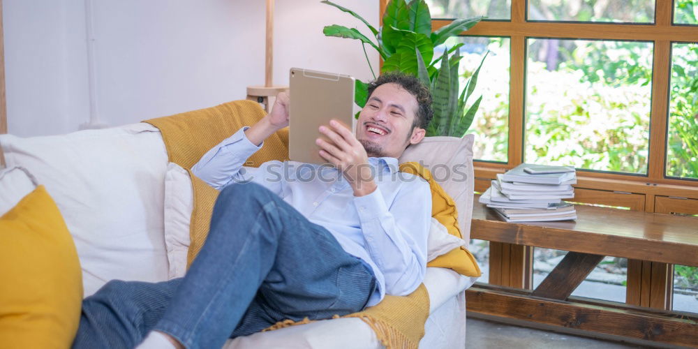 Similar – Image, Stock Photo Woman at home reading in an armchair