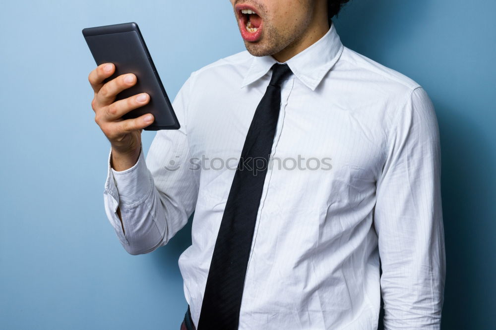 Similar – Man celebrating good news.