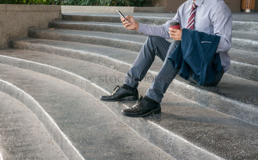 Similar – Attractive businesswoman using smartphone while sitting