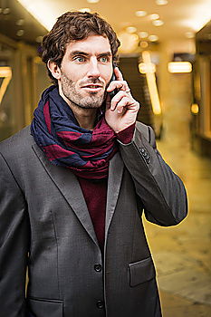 Similar – Image, Stock Photo Portrait of a stylish young handsome long-haired unshaven man