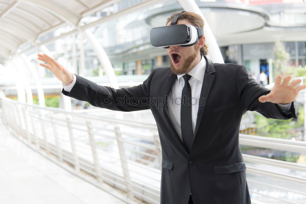 Similar – Image, Stock Photo afro businessman playing virtual reality simulation