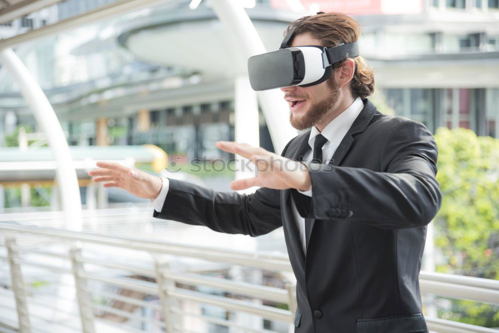 Similar – Image, Stock Photo afro businessman playing virtual reality simulation