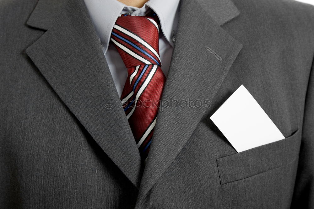 Folded letter of resignation, put in a jacket’s pocket of a man