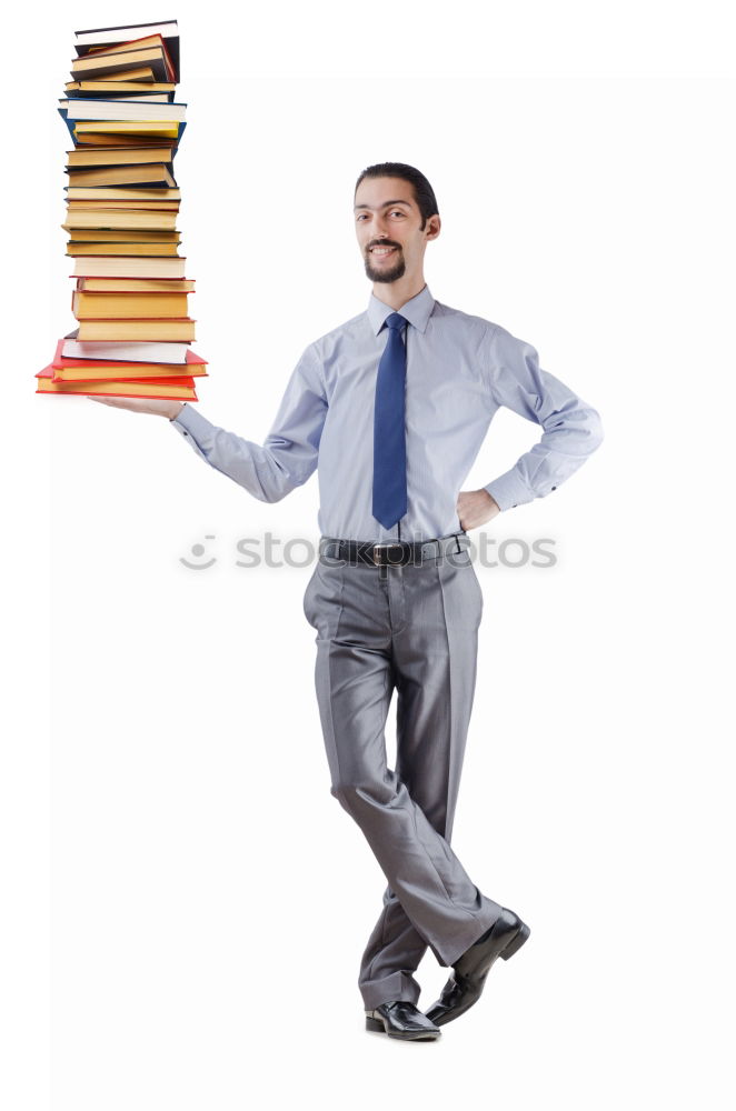 Similar – Man in book pile reading a book