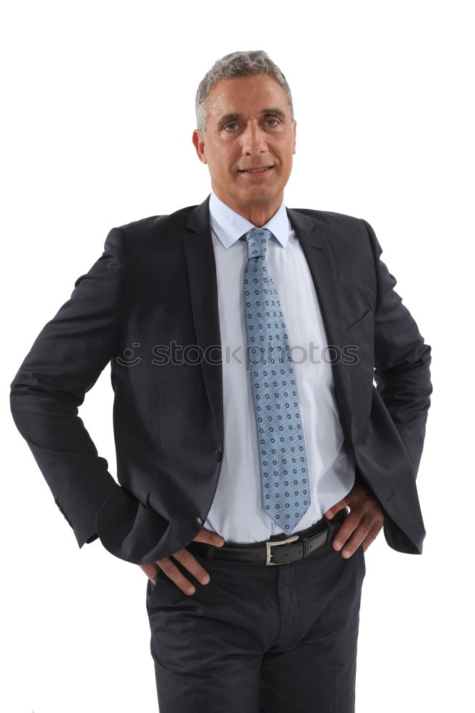 Similar – Senior businessman walking outside of modern office building