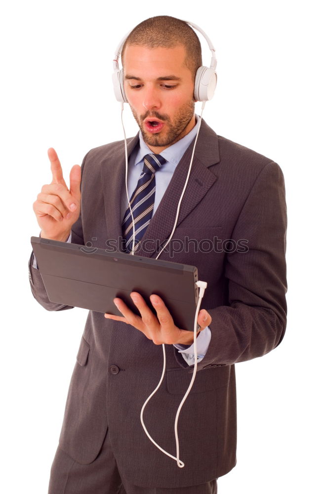 Similar – Black serious man listening to music in headphones