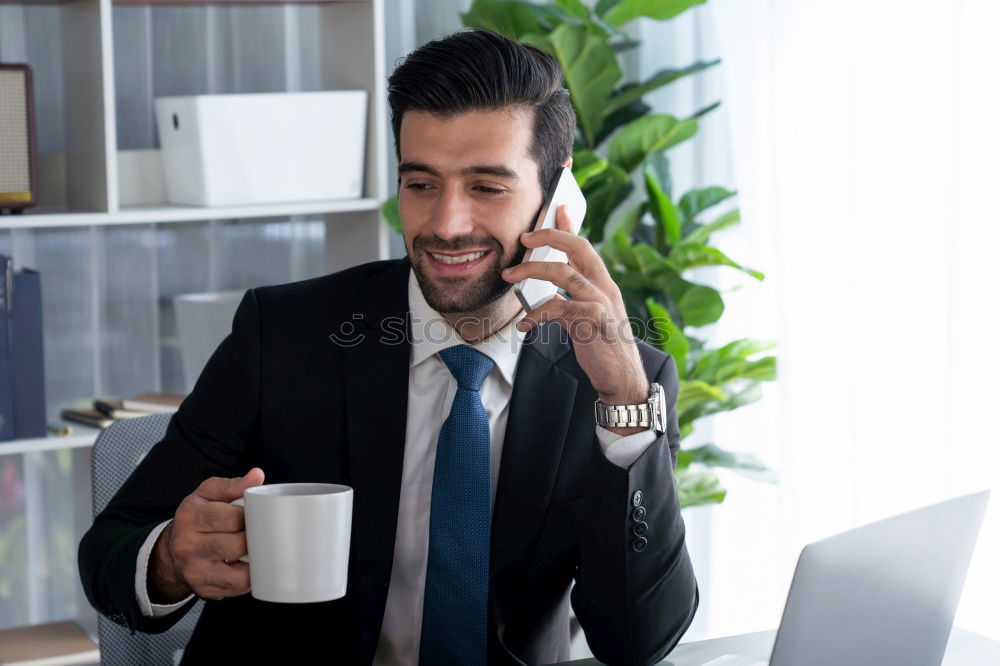 Image, Stock Photo Handsome businessman with striped tie sits at table with coffee making phone call and using his tablet