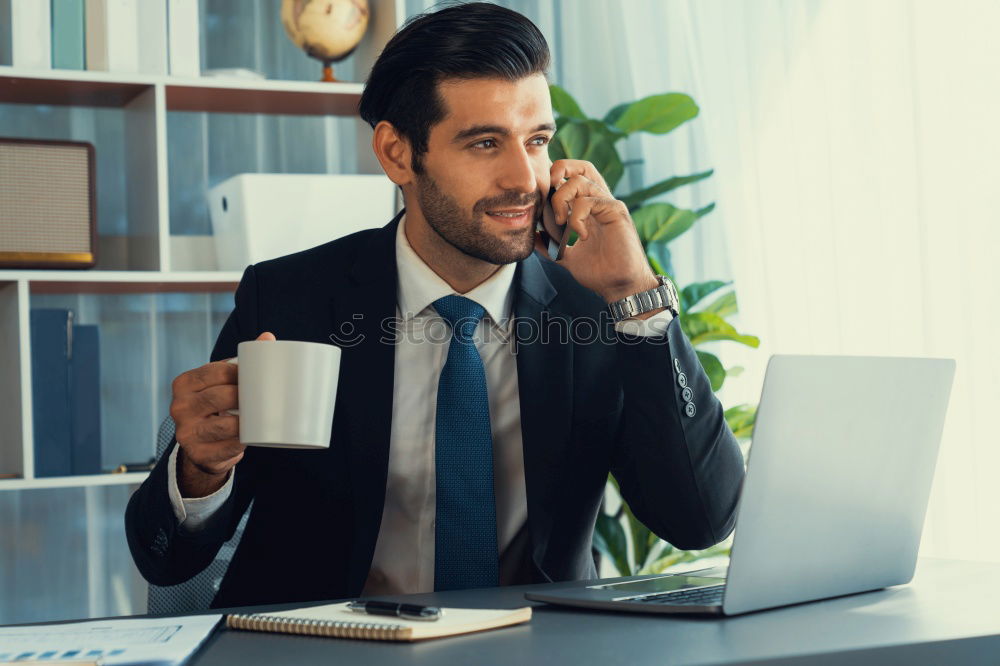 Similar – Image, Stock Photo Handsome businessman with striped tie sits at table with coffee making phone call and using his tablet