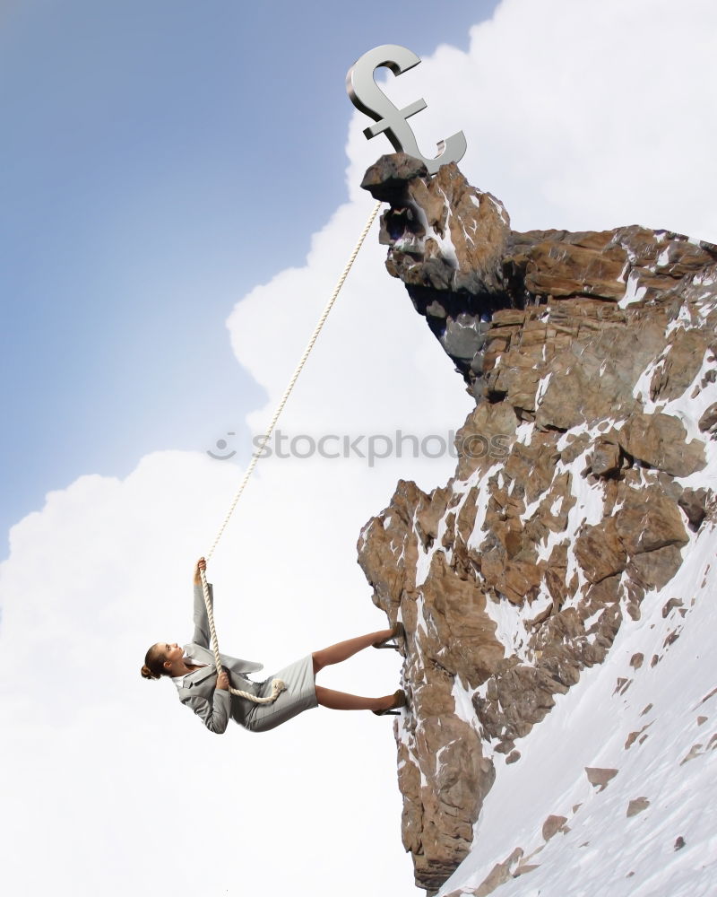 Similar – Climber reaching for a helping-hand.