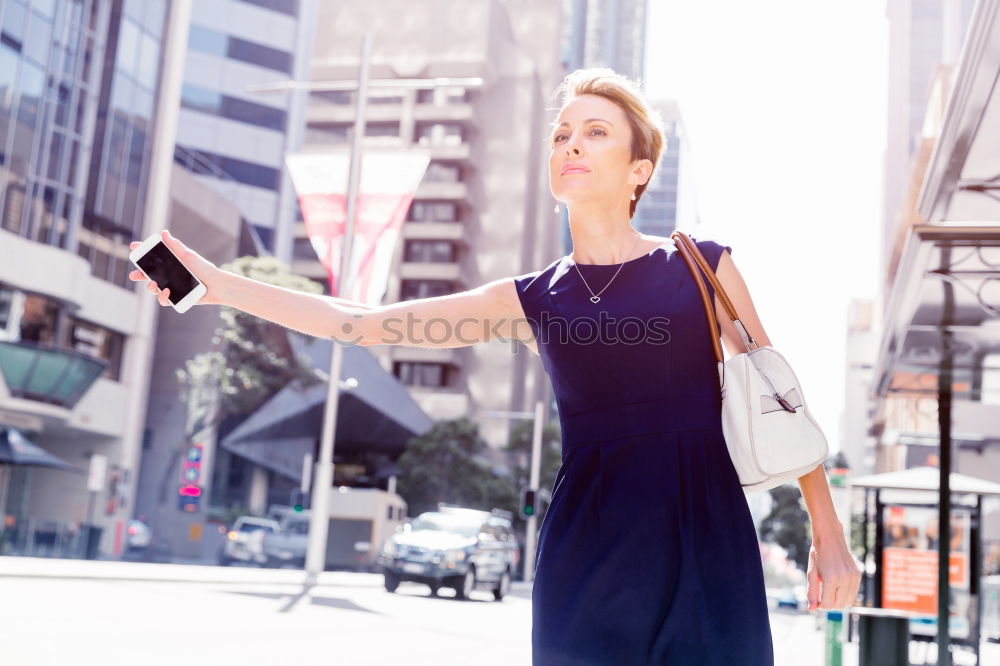 Similar – Image, Stock Photo Attractive blond woman chatting on her smartphone