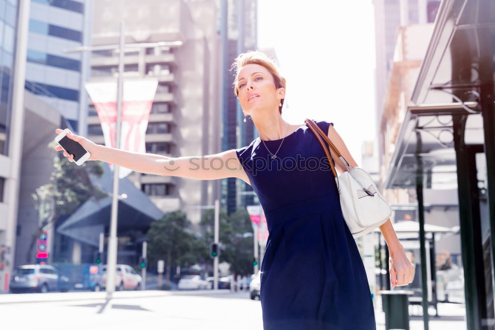 Similar – Image, Stock Photo Attractive blond woman chatting on her smartphone