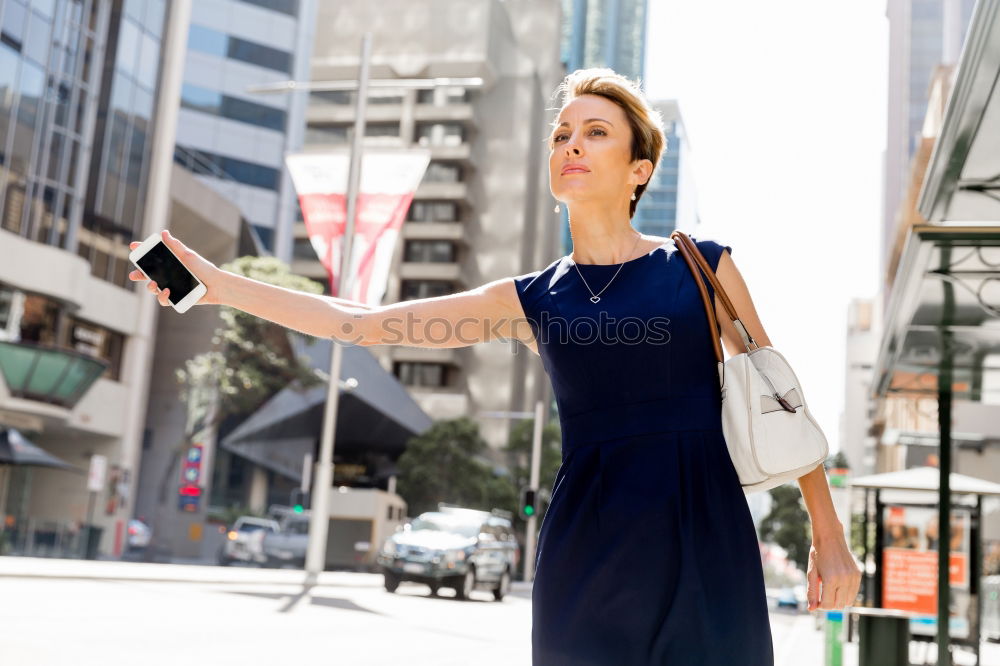 Similar – Image, Stock Photo Attractive blond woman chatting on her smartphone