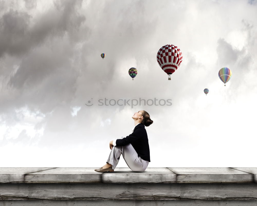 Child looking at the water from a ship