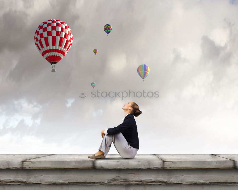 Similar – Child looking at the water from a ship