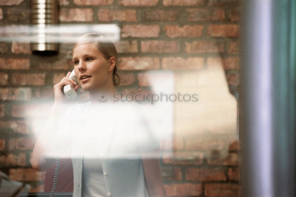 Similar – Mature woman watching TV at home sitting on couch