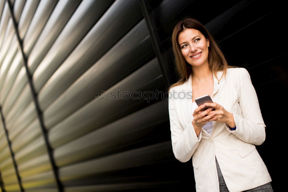 Similar – Image, Stock Photo Young businesswoman with tablet computer standing outside of an office building