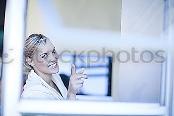 Similar – Image, Stock Photo Young thoughtful woman looking through the window