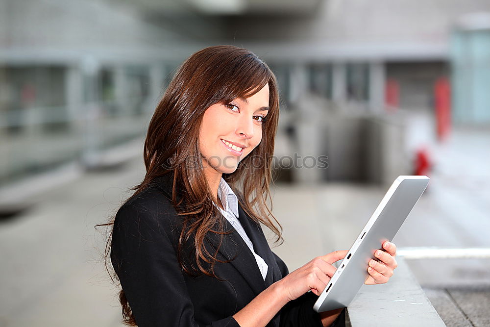 Similar – Image, Stock Photo Young businesswoman with tablet computer standing outside of an office building