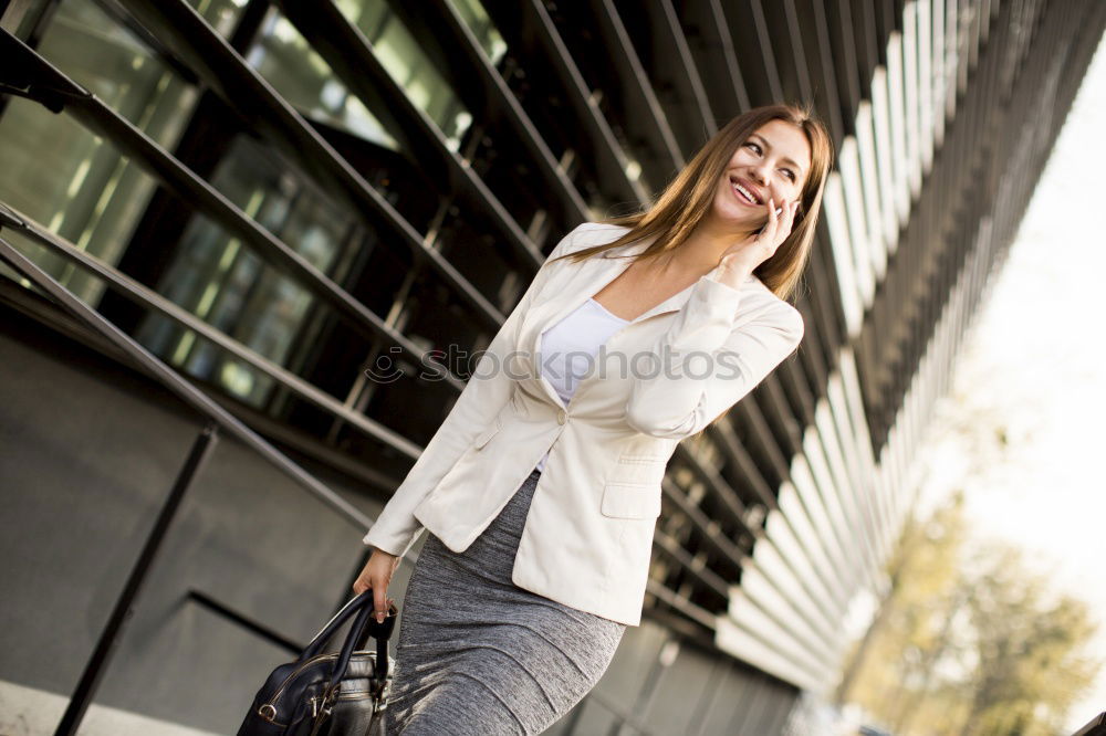 Similar – Image, Stock Photo Beautiful young businesswoman looking at camera.