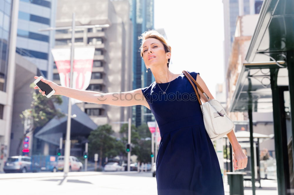 Similar – Image, Stock Photo Attractive blond woman chatting on her smartphone