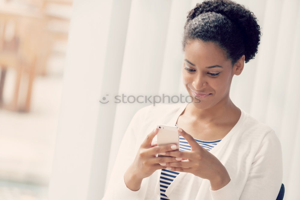 Similar – Black woman listening to the music with headphones