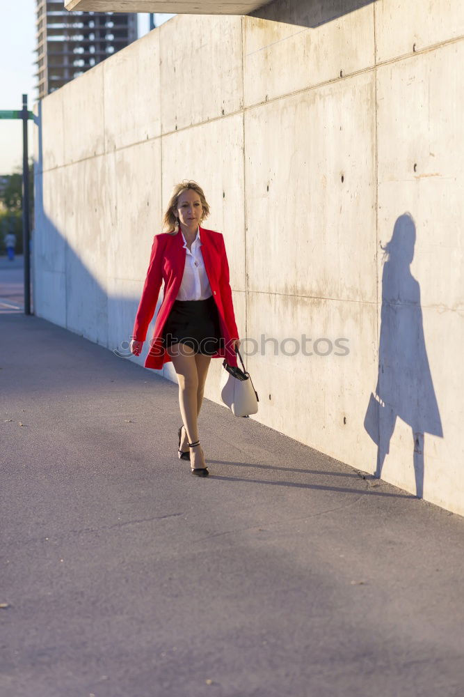 Similar – Image, Stock Photo Redhead teen woman alone in an urban place