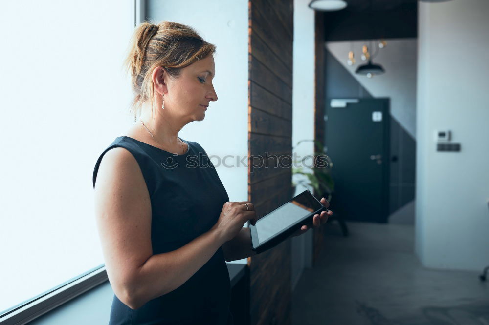 Similar – Image, Stock Photo Woman browsing smartphone in office
