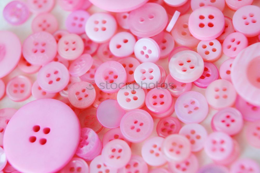 Similar – Image, Stock Photo Colorful bottons on pink background