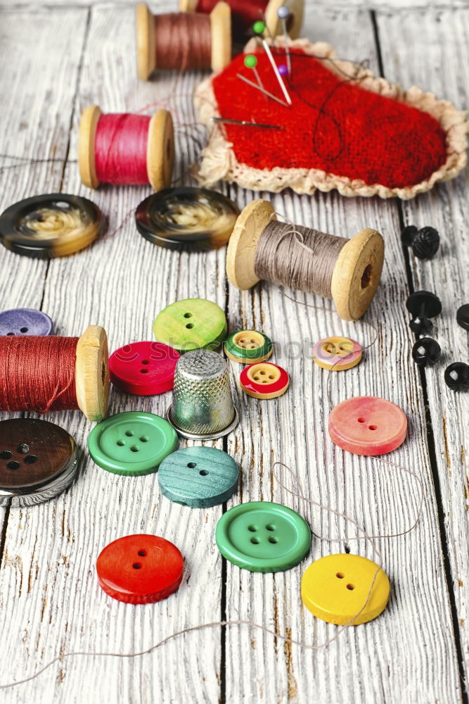 Similar – Thread spools and buttons