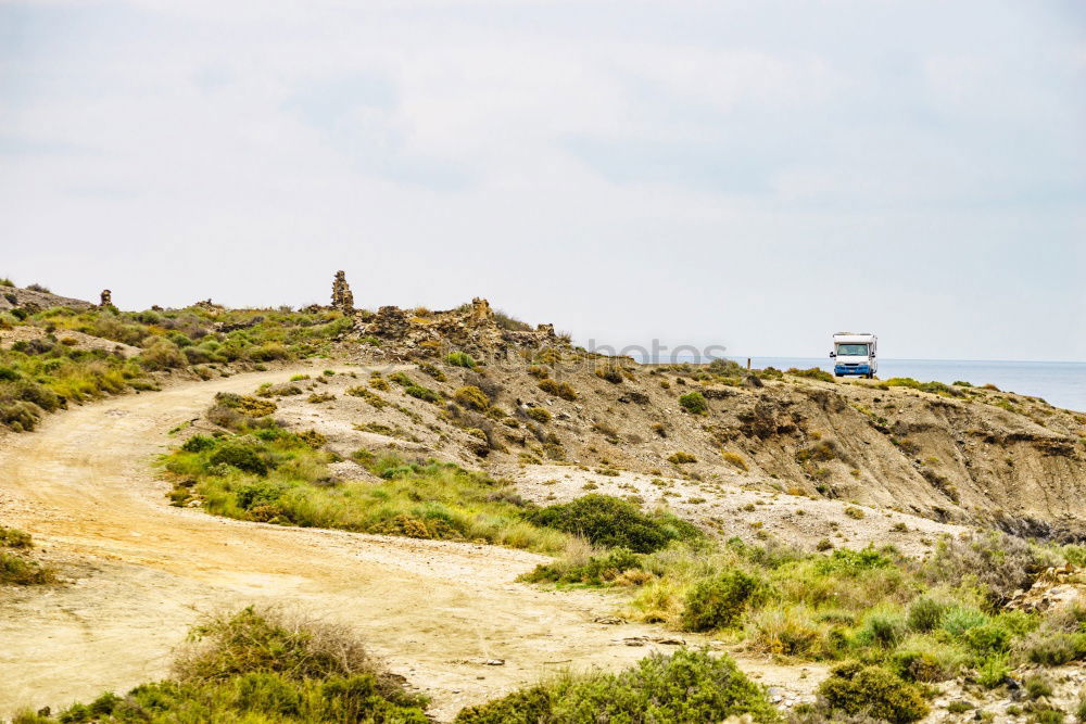 Similar – Image, Stock Photo Behind it, the beach on the road again.