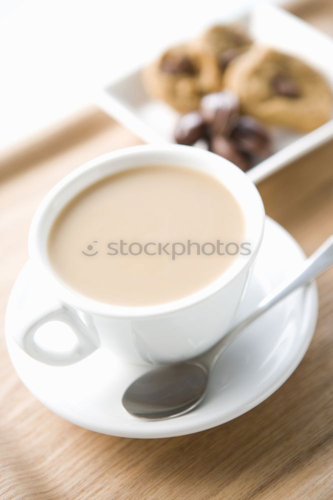 Similar – Image, Stock Photo A few books with cup of coffee and cookies on wooden floor