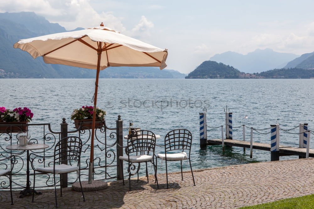 Similar – Image, Stock Photo Summer on Lake Maggiore with a man who takes pictures