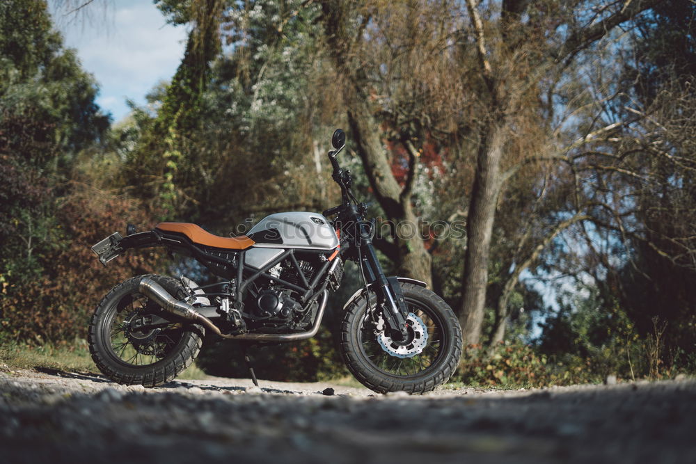 Similar – Image, Stock Photo Biker checking with a motorcycle