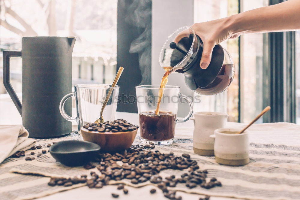 Image, Stock Photo Hand drip coffee, pouring water on coffee ground with filter drip style