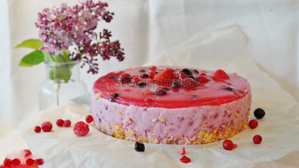 Similar – Pink sweet lemonade made of raspberry juice with frosted blackberries and strawberry blossom in a glass with sugar rim and drinking straw on striped tablecloth