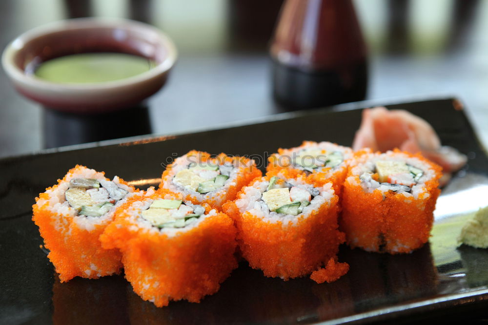 Similar – sushi assortment in white plate and soya sauce