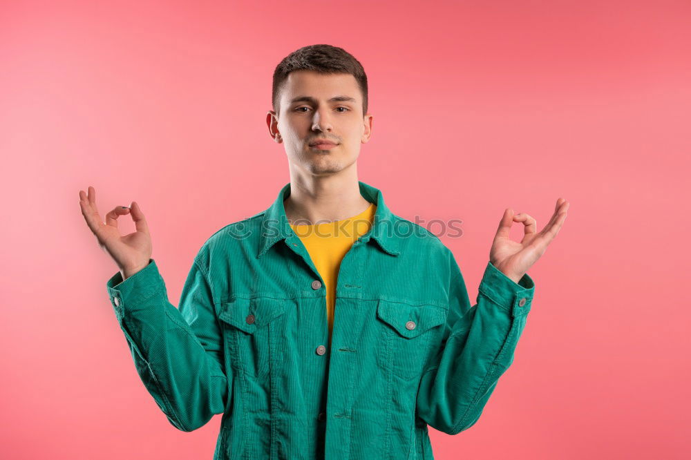 Similar – Image, Stock Photo Handsome man posing on orange wall